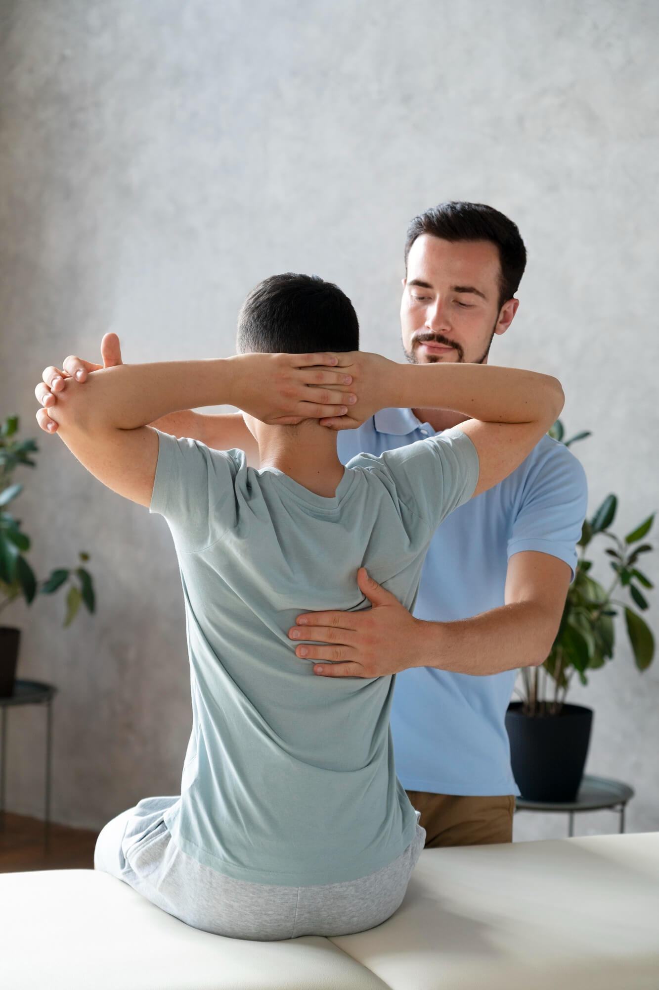 Chiropractor providing spinal care and chiropractic adjustment at Mesa Chiropractic Rehab and Wellness in Mesa AZ