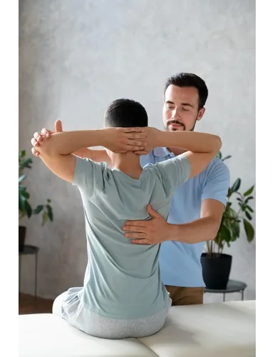 Chiropractor providing spinal care and chiropractic adjustment at Mesa Chiropractic Rehab and Wellness in Mesa AZ